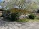 Exterior view of the home with screened-in porch, and covered parking space at 406 Dallas Hwy, Villa Rica, GA 30180