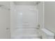 Clean and modern bathroom featuring a shower-tub combo with white walls at 1477 Patricia Dr, Morrow, GA 30260