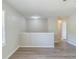 Spacious and bright living room featuring new floors and fresh neutral paint throughout at 1477 Patricia Dr, Morrow, GA 30260