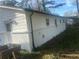 The exterior of the home has been updated and painted white at 1905 Robinhill Ct, Tucker, GA 30084