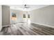 Spacious bedroom with wood-look floors and large windows offering lots of natural light at 4285 Haynes Cir, Snellville, GA 30039