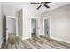 Bedroom showcasing a closet, attached bathroom, and luxury vinyl plank flooring at 4285 Haynes Cir, Snellville, GA 30039