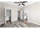 Bedroom showcasing a closet with built-in shelving and luxury vinyl plank flooring at 4285 Haynes Cir, Snellville, GA 30039