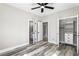 Bedroom showcasing a closet with built-in shelving and luxury vinyl plank flooring at 4285 Haynes Cir, Snellville, GA 30039