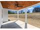 This covered patio features a wood ceiling and a ceiling fan to ensure comfort at 4285 Haynes Cir, Snellville, GA 30039