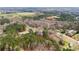 Aerial view of property nestled among the trees at 75 Woodfield Rd, Covington, GA 30014