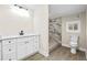 Beautiful bathroom with gorgeous new vanity and stunning marble shower at 75 Woodfield Rd, Covington, GA 30014