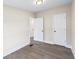 This bright bedroom is freshly painted and features a closet and modern flooring at 75 Woodfield Rd, Covington, GA 30014