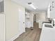 Bright kitchen with stainless steel appliances, white cabinets, and modern countertops at 75 Woodfield Rd, Covington, GA 30014
