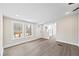 Bright living room featuring new floors, fresh paint, and natural light at 75 Woodfield Rd, Covington, GA 30014
