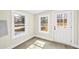 Inviting room featuring natural light from windows and a stylish door leading outdoors at 75 Woodfield Rd, Covington, GA 30014