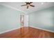 Bedroom featuring hardwood floors, light blue walls, white trim, and recessed lighting at 101 Gold Leaf Ct, Canton, GA 30114