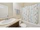 Bathroom with a tub and shower featuring a blue and gray bird-themed curtain at 104 Amelia Way, Ellenwood, GA 30294