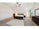 Large main bedroom with natural light, a ceiling fan and neutral walls at 104 Amelia Way, Ellenwood, GA 30294