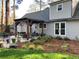 Backyard patio with pergola, seating, and landscaping, perfect for relaxing outdoors at 1495 Longwood Sw Dr, Marietta, GA 30008