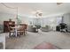 Spacious living room featuring a dining area, multiple seating options, and lots of light at 1495 Longwood Sw Dr, Marietta, GA 30008
