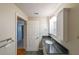 Bathroom with dark granite counters and white cabinets and fixtures at 1800 Clairmont Lk # A719, Decatur, GA 30033