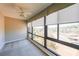 Inviting bedroom featuring neutral carpet, a ceiling fan, and lots of natural light from the expansive, sun-drenched windows at 1800 Clairmont Lk # A719, Decatur, GA 30033