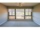 Serene bedroom with neutral carpeting, large windows, and custom window treatments that provide great views and natural light at 1800 Clairmont Lk # A719, Decatur, GA 30033