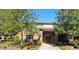 Attractive building with brick facade, complemented by lush landscaping, offering a welcoming entrance at 1800 Clairmont Lk # A719, Decatur, GA 30033