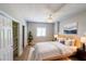 Comfortable bedroom with a ceiling fan, large window, and stylish decor at 1800 Clairmont Lk # A719, Decatur, GA 30033