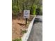 Community speed limit sign posted near a road and greenery at 1800 Clairmont Lk # A719, Decatur, GA 30033