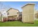 Expansive backyard featuring a multi-level wood deck to enjoy outdoor living at 2895 Wildflower Ln, Snellville, GA 30039