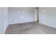 Spacious bedroom with carpeting and neutral walls, illuminated by natural light at 864 Oakhill Ct, Stone Mountain, GA 30088