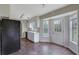 Functional kitchen featuring wood floors, essential appliances, and a convenient layout at 864 Oakhill Ct, Stone Mountain, GA 30088