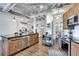 Modern kitchen features stainless steel appliances, granite countertops, and an open layout at 878 Peachtree Ne St # 535, Atlanta, GA 30309