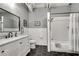 Modern bathroom featuring subway tile, a new vanity with marble countertop, and sleek black hardware at 878 Peachtree Ne St # 535, Atlanta, GA 30309