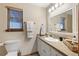 Bathroom featuring a spacious vanity, modern fixtures, and a large mirror, perfect for getting ready at 4062 Wildflower Ln, Tucker, GA 30084