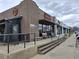 Commercial building exterior with storefront and benches at 4062 Wildflower Ln, Tucker, GA 30084