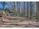Secluded backyard area with mature trees creating a tranquil outdoor space at 4113 Stutz Ct, Tucker, GA 30084