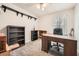 Office space in a bedroom with great lighting and built in shelving at 4113 Stutz Ct, Tucker, GA 30084