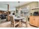 Cozy breakfast nook area with wood table and seating, next to the living room at 4113 Stutz Ct, Tucker, GA 30084