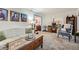 Comfortable living room with floral sofa and view of front yard at 4113 Stutz Ct, Tucker, GA 30084