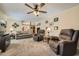 Spacious living room with wall paneling, plush seating, and modern entertainment center at 4113 Stutz Ct, Tucker, GA 30084