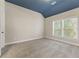 Spacious bedroom with vaulted ceiling, carpet, and natural light at 2315 Monet Dr, Cumming, GA 30041