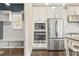 Modern kitchen showcases stainless steel appliances and built-in features including a microwave and oven combination at 2315 Monet Dr, Cumming, GA 30041