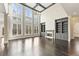 Bright living room with soaring windows, fireplace, built-in bookcases, and stylish decor at 2315 Monet Dr, Cumming, GA 30041