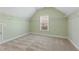 Spacious walk-in closet with built-in shelving and natural light at 2315 Monet Dr, Cumming, GA 30041