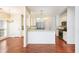Open kitchen view, featuring granite countertops, stainless steel appliances, and an inviting breakfast bar at 2698 Glenrose Hl, Atlanta, GA 30341