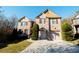 Charming two-story brick home with a well-manicured lawn and an attached two-car garage at 3196 Moon Stone Ln, Snellville, GA 30039