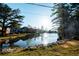 Beautiful water view of a calm lake at 3196 Moon Stone Ln, Snellville, GA 30039