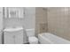 Bright bathroom featuring a tiled shower-tub combo and updated vanity at 3618 Mansfield Ln, Snellville, GA 30039