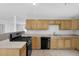 Updated kitchen with stainless steel appliances and eat in area at 3618 Mansfield Ln, Snellville, GA 30039