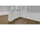 Bright and modern living room featuring sleek floors and decorative trim at 3618 Mansfield Ln, Snellville, GA 30039