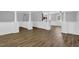 Bright, expansive living room with sleek floors and an open-concept design at 3618 Mansfield Ln, Snellville, GA 30039