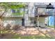 Backyard features a cozy patio area with stylish seating and a fire pit at 1202 W Briar Gate Ct, Riverdale, GA 30296